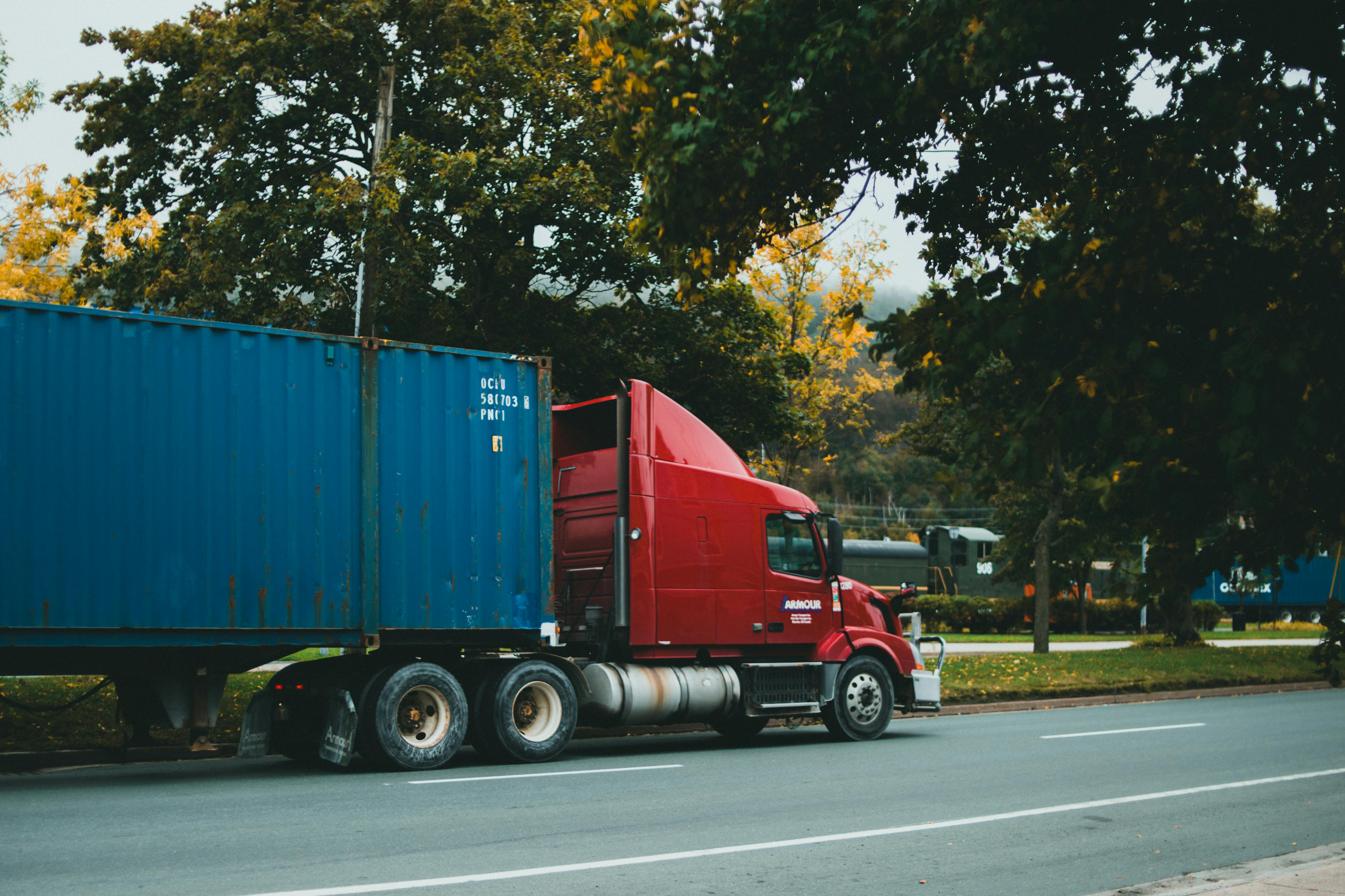 Heavy haul truck transporting construction equipment and oversized cargo